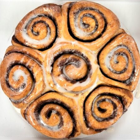 You will enjoy this NEW circular homestyle pan of (7) 6 oz ooey gooey, gourmet cinnamon rolls. Perfect for any occasion: breakfast, dessert, holidays, business brunches, impromptu treat, you name it! Store in your freezer for up to a year and simply thaw, warm and serve!